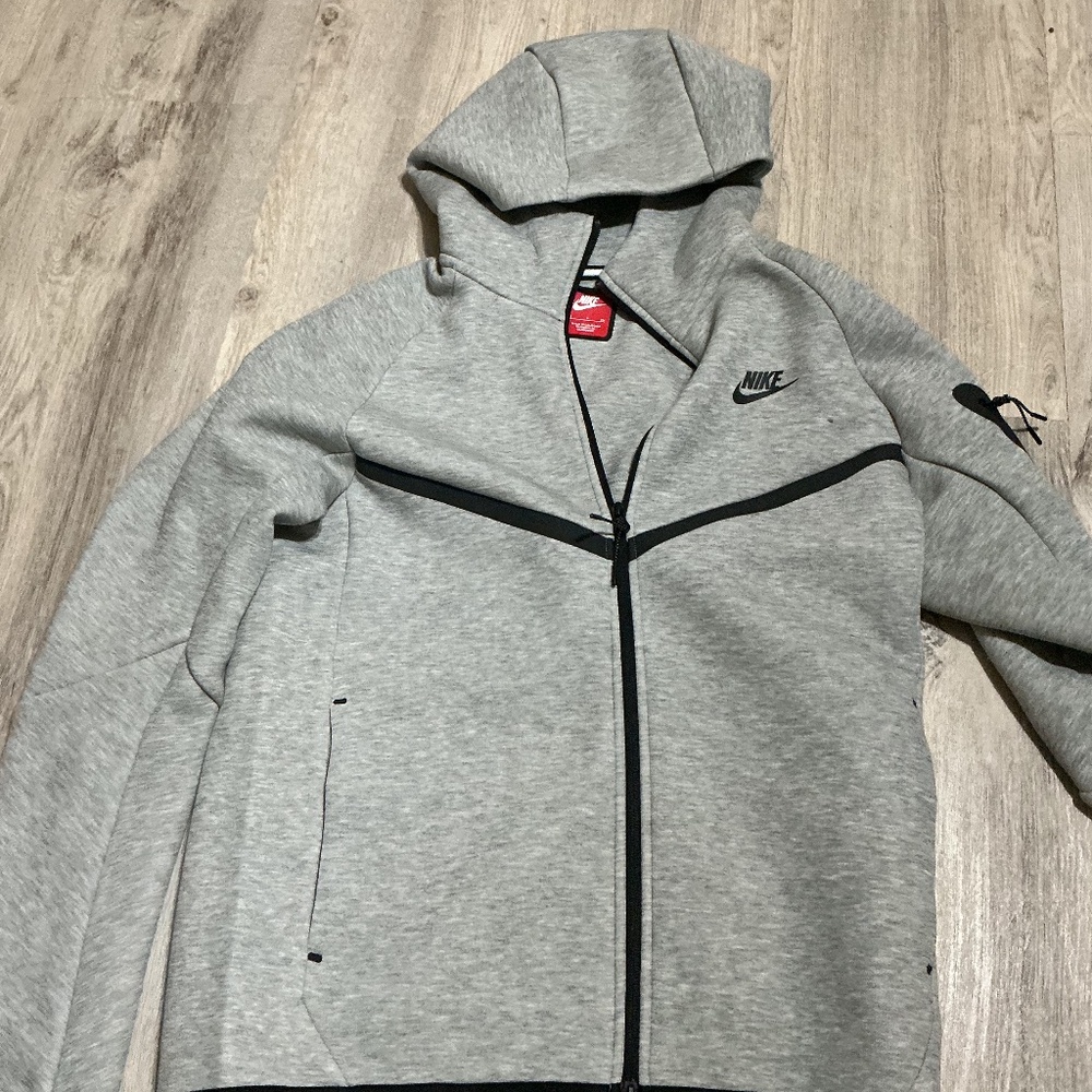 Small grey Nike tech